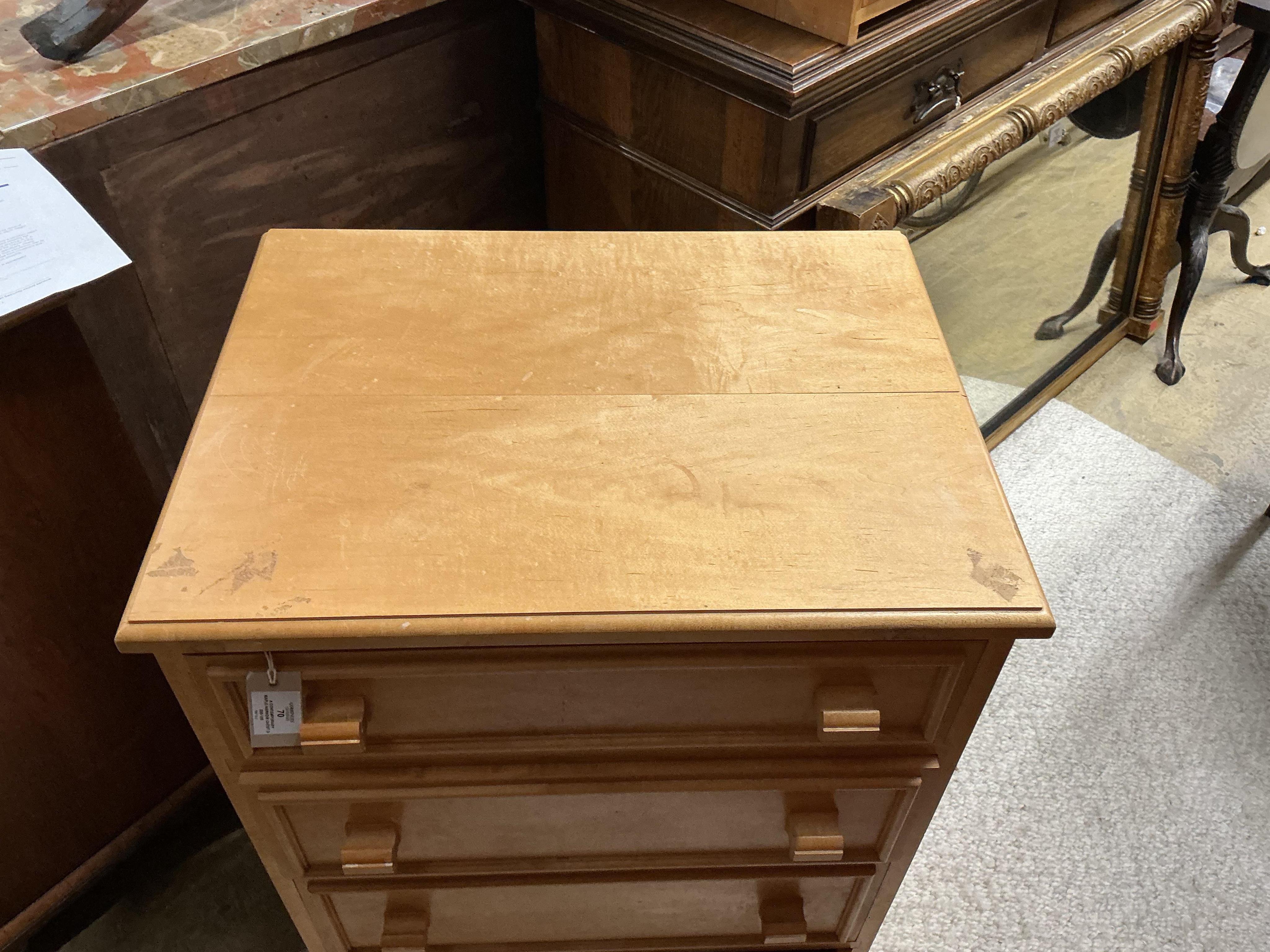 A Contemporary maple narrow chest of drawers, width 61cm, depth 46cm, height 92cm